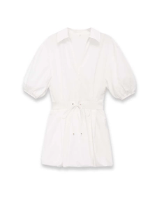 Detail view of white poplin mini dress showing V-neckline and puff sleeves with waist tie