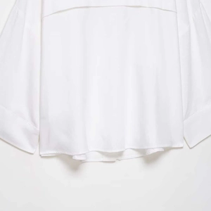 Minimalist white batwing sleeve blouse with premium woven texture and loose summer fit