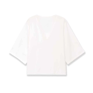Top in maglia bianca da donna con profondo scollo a V, vestibilità ampia e mezze maniche