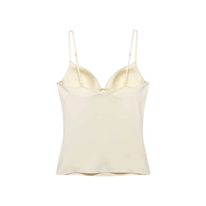 Detail view of seamless beige bra top with built-in pads and delicate spaghetti straps