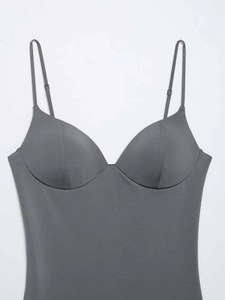 Close-up of seamless dark grey camisole top with adjustable straps and built-in pads