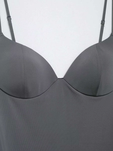 Close-up of dark grey seamless camisole with molded cups and thin adjustable straps