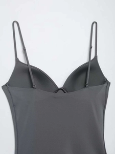 Detail view of seamless dark grey camisole featuring V-neckline and built-in molded cups