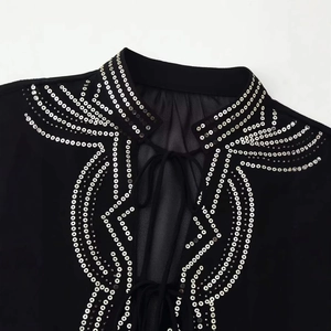 Women black loose round neck mesh shirt with silver stud rivet and sequin patterns