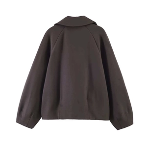 Back view of a dark coffee brown cropped blazer jacket with a wide collar and relaxed fit