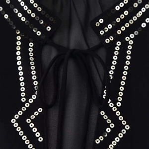 Black loose fit round neck shirt with sheer fabric and metallic sequin details