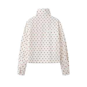 Detailed back view of casual puff sleeve jacket with red polka dots and high neck design
