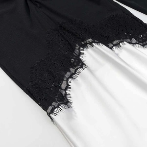 Elegant black and white contrast lace patchwork dress with delicate floral details