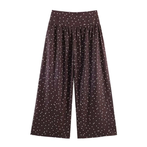 Vintage high-waisted polka dot wide-leg trousers in burgundy with gathered waist details