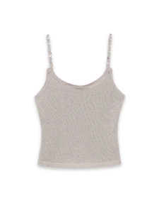 Close-up detail of knitted tank top with decorative shell buttons on thin straps