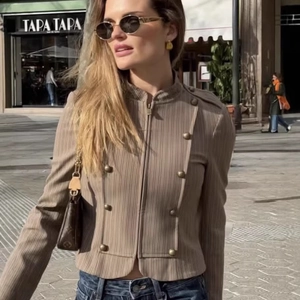 Women's slim fit striped military jacket in khaki with vintage metal buttons on street