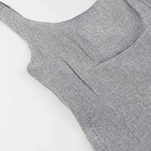 Detail view of the gray square neck vest dress featuring textured linen fabric and stitching