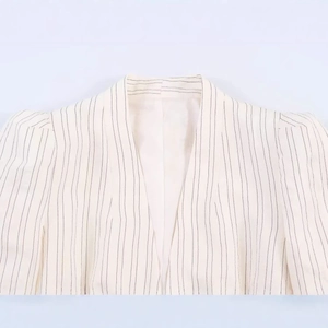 Women's V-neck pinstripe blazer with puff sleeves and cinched waist in off-white