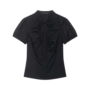Women's black short sleeve shirt with ruffle trim, tie neck and cinched waist design