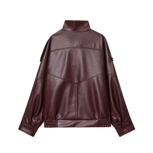 Detailed view of dark burgundy PU leather biker jacket with loose fit and ribbed cuffs