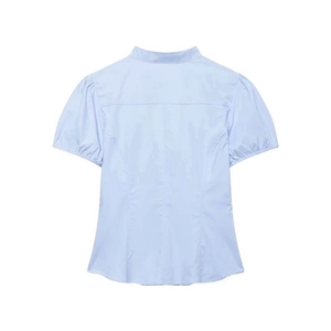 Light blue short sleeve shirt with puff sleeves and back waist darts on white background