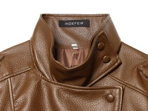 Close-up of brown PU leather jacket featuring litchi texture, stand collar and metal button