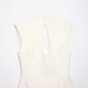 Elegant off-white sleeveless dress with keyhole neck and metal buckle detail