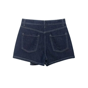 Detail view of denim shorts showing high waist cut, dual back pockets and white stitching