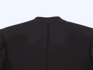 Detail view of high-quality back collar and center seam of the black asymmetrical blazer