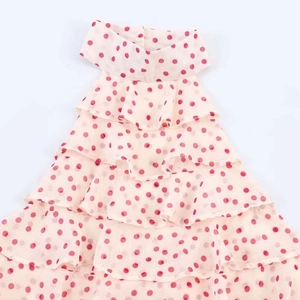 Polka dot georgette halter top with tiered ruffles in soft pink and dark red