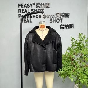 Front view of black faux leather shearling jacket with plush collar on mannequin