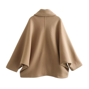 Back view of minimalist camel wool blend cape coat with oversized wide lapel and relaxed fit