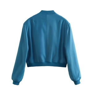 Rear view of a sky blue cropped bomber jacket with ribbed cuffs and central seam detail
