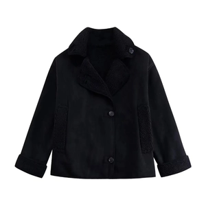 Detail of black shearling trim on faux suede winter jacket with button closure