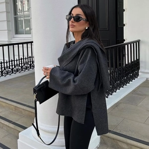 Asymmetric dark grey knit jacket with scarf collar and side slits in minimalist style