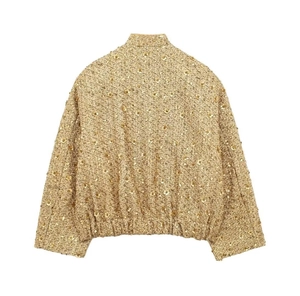 Rear view of champagne gold sequin tweed jacket with standing collar and elastic hem