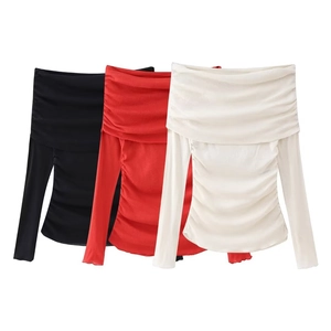 Detail of off-shoulder ruched waist long sleeve t-shirt in black, red, and white colors