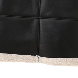 Veste en cuir noir pour femme avec bordure en peau de mouton et coutures croisées