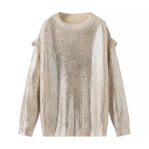 Women's loose metallic knit sweater with round neck and tiered shoulder design in champagne gold
