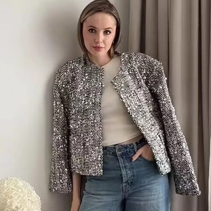 Short silver sequin tweed jacket for women featuring a collarless open-front design
