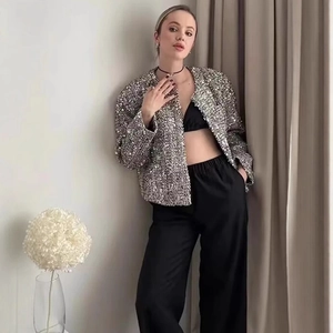 Elegant women's silver sequin tweed jacket with round neck for party evening wear