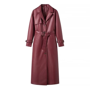 Women's long burgundy faux leather trench coat with lapel collar and waist belt