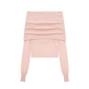 Pink knit long sleeve top with off-shoulder neckline and ribbed cuffs on white background