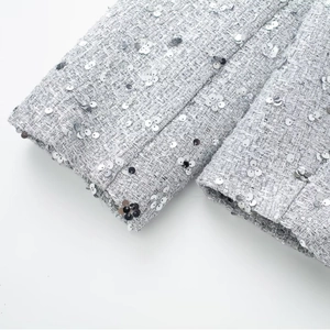 Silver sequin tweed jacket for women featuring elegant floral embroidery and textured fabric