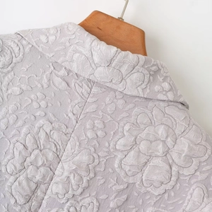 Women's light purple jacquard blazer with elegant floral texture and lapel design