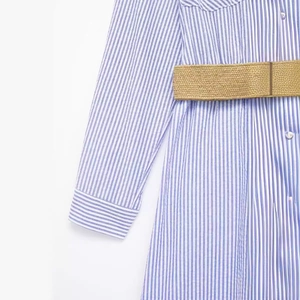 Blue and white striped long sleeve shirt dress with a khaki woven straw belt
