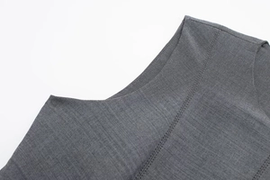 Detail of grey skater dress neckline with high-quality double needle stitching work