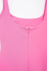 Detail of pink sleeveless dress showing U-neckline and invisible zipper closure