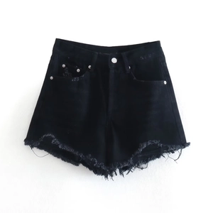 High-waisted black denim shorts with distressed frayed hem and vintage rivet details