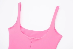 Detail view of pink bodycon dress featuring a square neckline and hidden back zipper