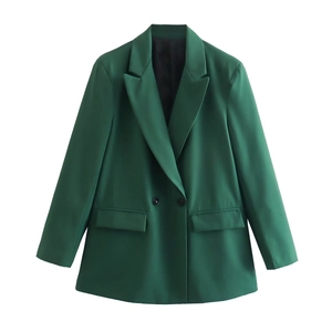 Detail view of dark green double-breasted blazer with lapel collar and flap pockets
