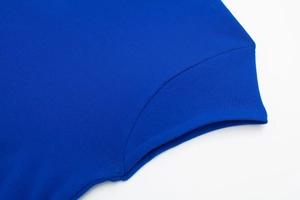 Detail of royal blue ribbed knit texture and stitching on women's summer dress