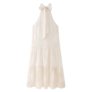 Elegant off-shoulder halter dress in cream white with floral jacquard and tiered hem