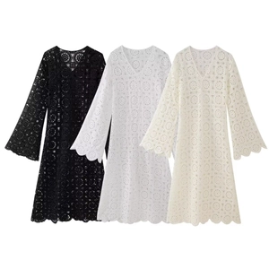 Bohemian V-neck crochet lace maxi dress with bell sleeves in black, white, and cream