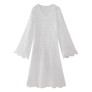 White lace crochet maxi dress featuring a V-neck and flared sleeves in boho style